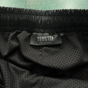 Conjunto Trapstar Irongate 2.0 Shellsuit Vermelho Preto