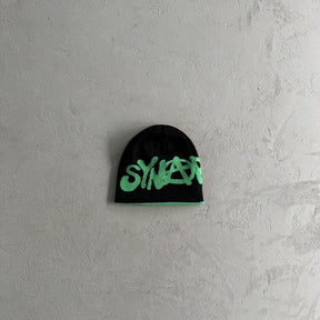 Touca Syna World “Synarchy” Reversible