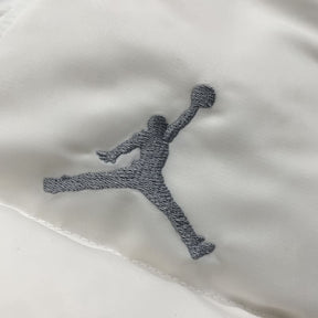 Jaqueta Puffer Jordan x Supreme