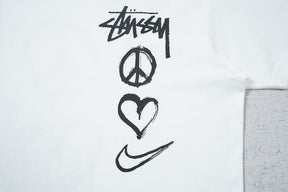 Camiseta Nike x Stussy Peace Love Swoosh